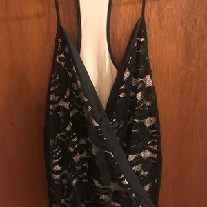 Express black and gold racer back top